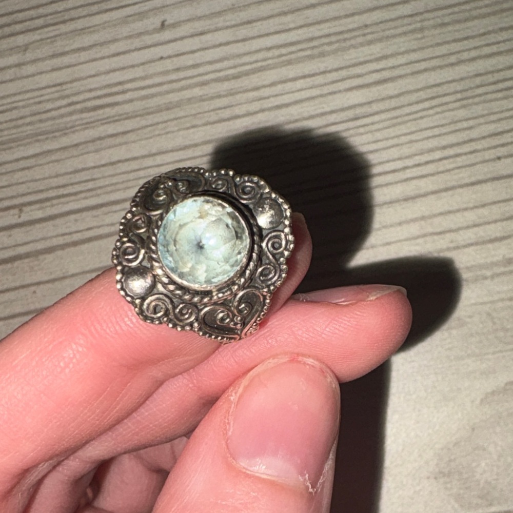 Elegant Silver-Toned Ring with Blue Stone